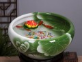 鱼缸中养莲花，打造清雅水景（简单易行的养护方法让你轻松拥有美丽莲花）